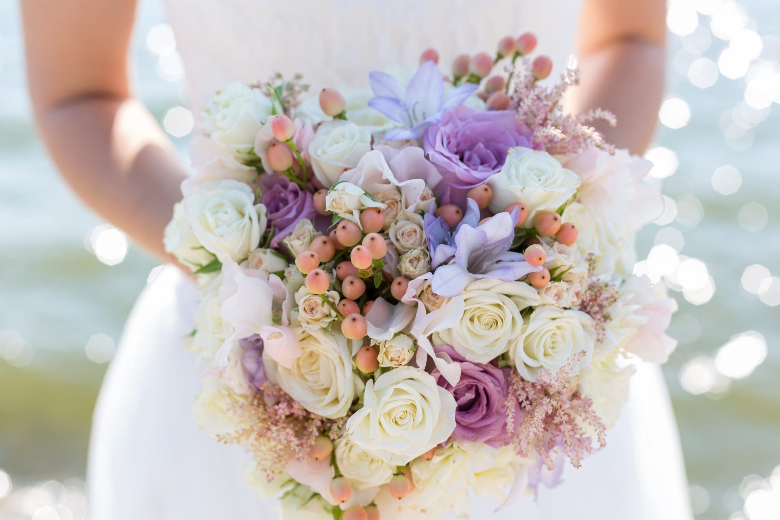 beautiful wedding bouquet in the hands of the bride