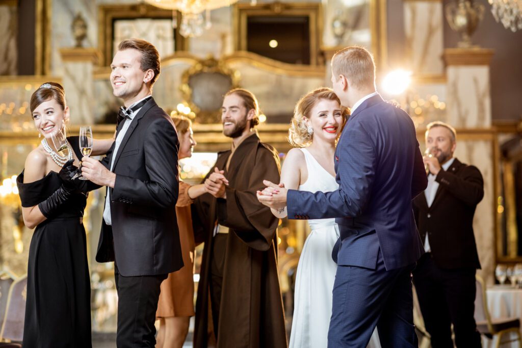 Group of elegant people dancing indoors - Dance Pizazz