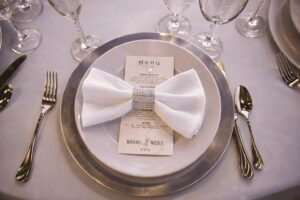 Place setting at a Pizazz Ballroom wedding reception